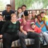 עדיאל ותהילה עם ילדיהם וחניכי כפר הנוער
