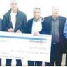 חברי סופר פארם מחזיקים צ'ק גדול
